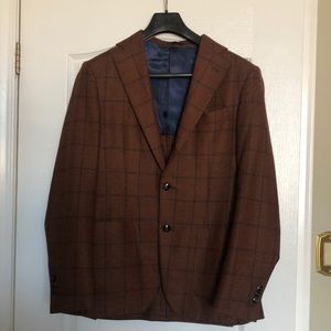 Hand Made in Italy with 100% Wool.